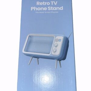 GEMS Retro TV Phone Stand - Light Blue
Fits Most Smartphones 
New In Box
